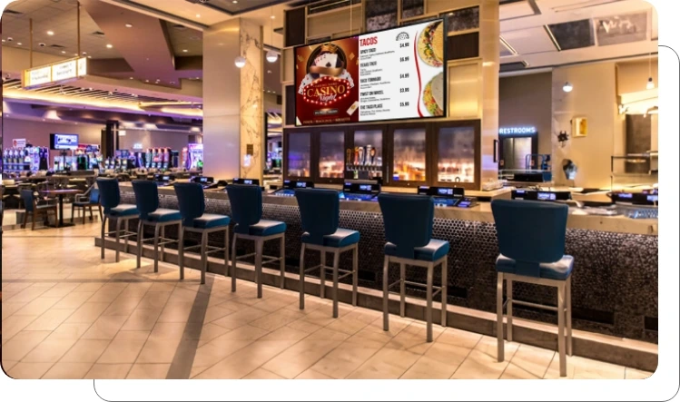 Digital signage screen showing streamlined digital menus and dining specials at casino Digital signage screen showing streamlined digital menus and dining specials at casino