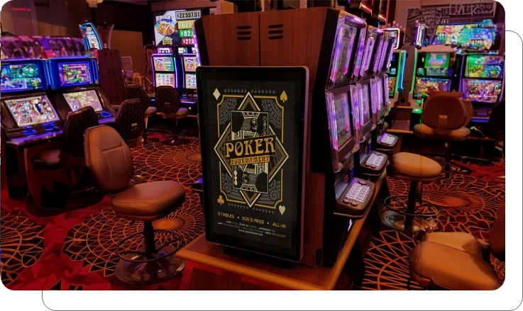 Digital signage screen showing e-gaming floor with live feeds and tournament displays at casino Digital signage screen showing e-gaming floor with live feeds and tournament displays at casino
